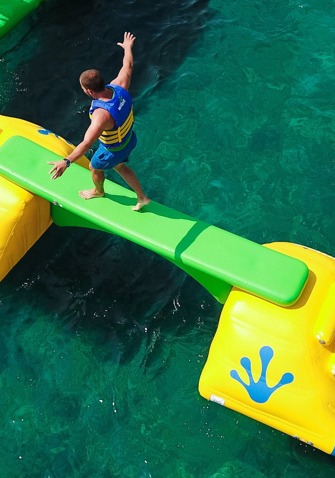 Swimmers on the inflatable modules at Chanterenne
